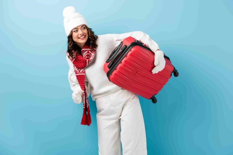 joyful-young-woman-in-winter-outfit-carrying-red-s-2023-11-27-05-21-01-utc